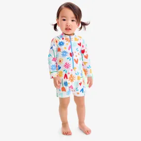 Baby one-piece rash guard in rainbow garden party